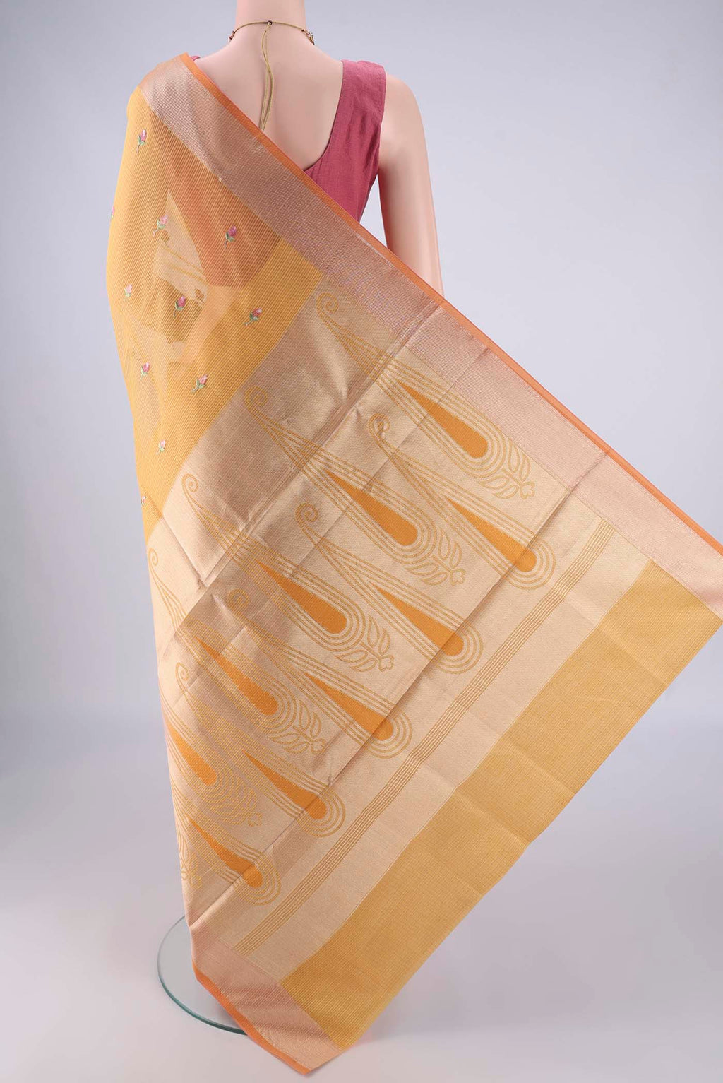 Flat view of Mustard Kota Cotton Saree with Embroidery on the body and Zari Border. 