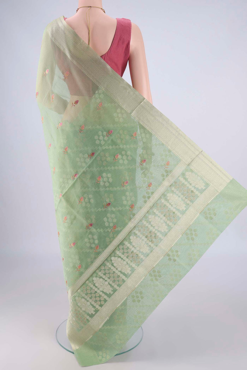 Flat view of Light Green Blended Kota Cotton Saree with Embroidery on the body and Zari Border. 