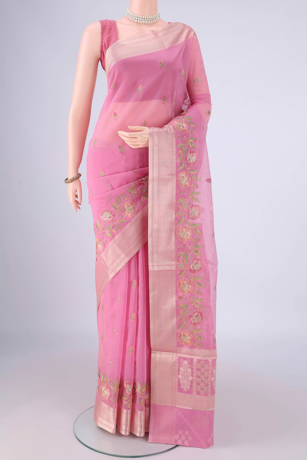 Pink Blended Kota Cotton Saree with Embroidery on the body and Zari Border.  displayed on a mannequin
