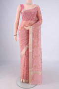 Rose pink Blended Kota Cotton Saree with Embroidery on the body and Zari Border.  displayed on a mannequin