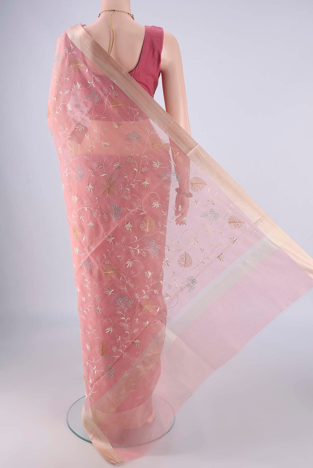 Flat view of Rose pink Blended Kota Cotton Saree with Embroidery on the body and Zari Border. 