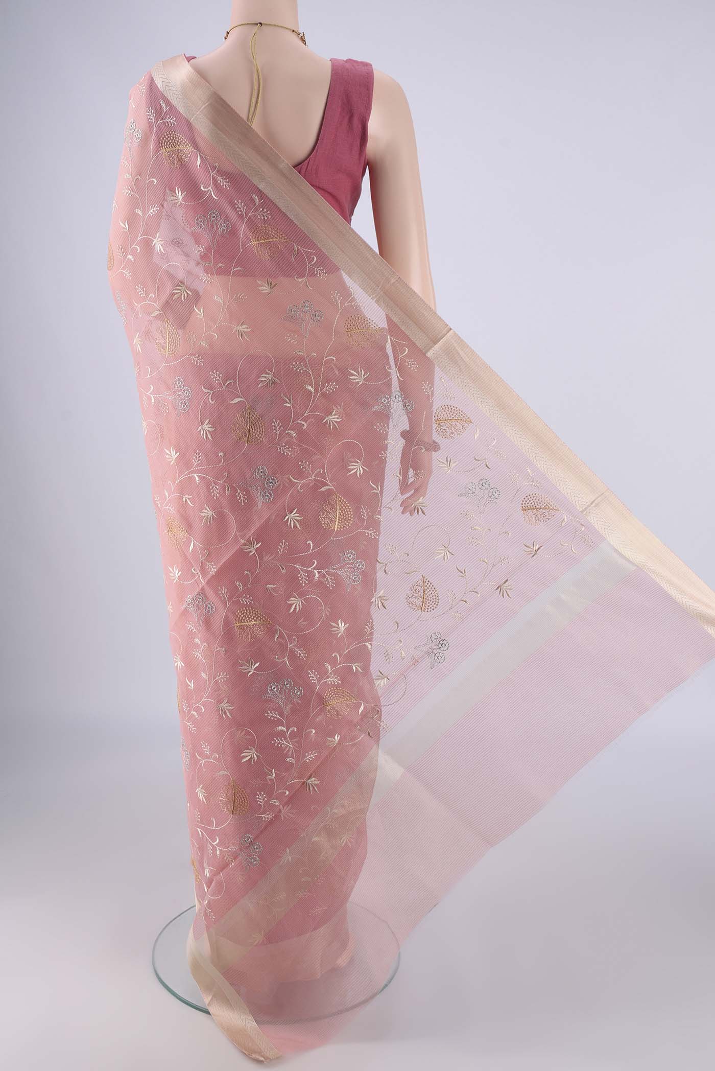 Flat view of Rose pink Blended Kota Cotton Saree with Embroidery on the body and Zari Border. 