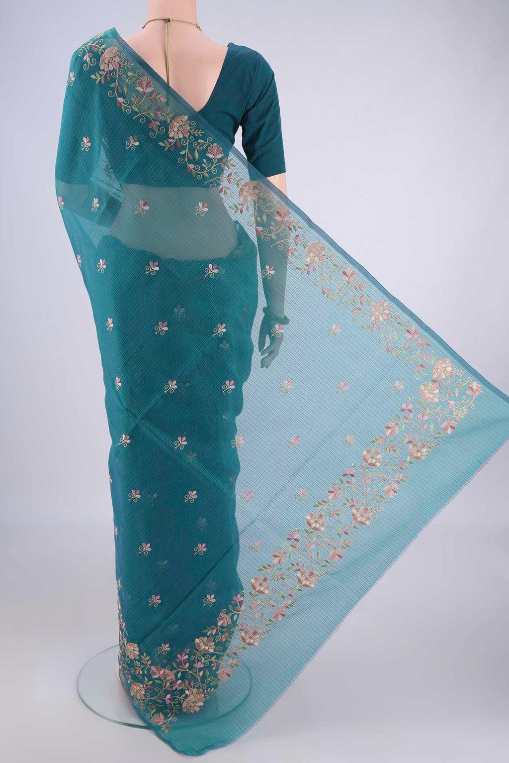Flat view of Peacock Blue Blended Kota Cotton Saree with Embroidery on the body and Embroidery Border. 