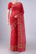 Red Blended Kota Cotton Saree with Embroidery on the body and Embroidery Border.  displayed on a mannequin