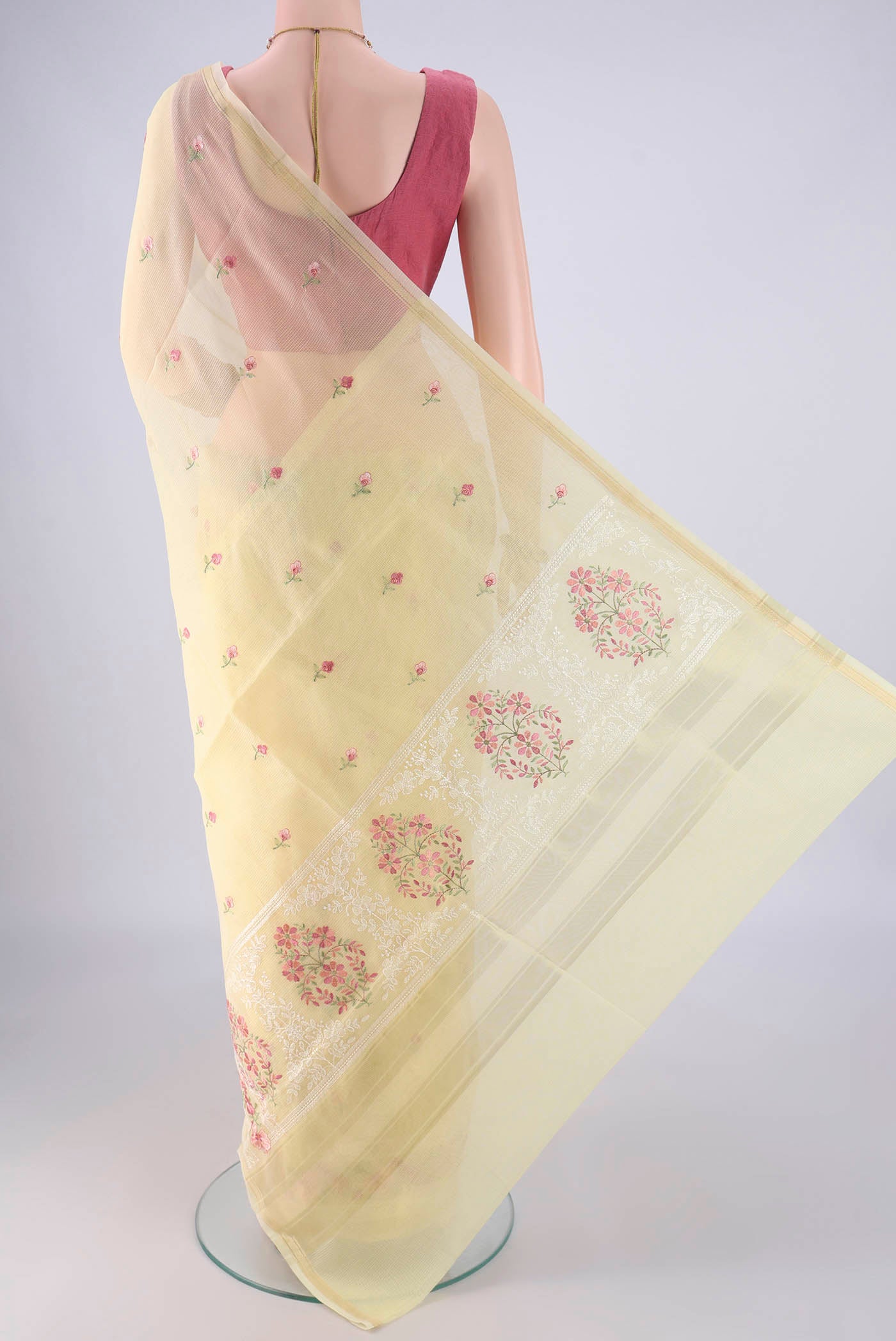 Flat view of Lemon Yellow Blended Kota Cotton Saree with Embroidery on the body and Zari Border. 