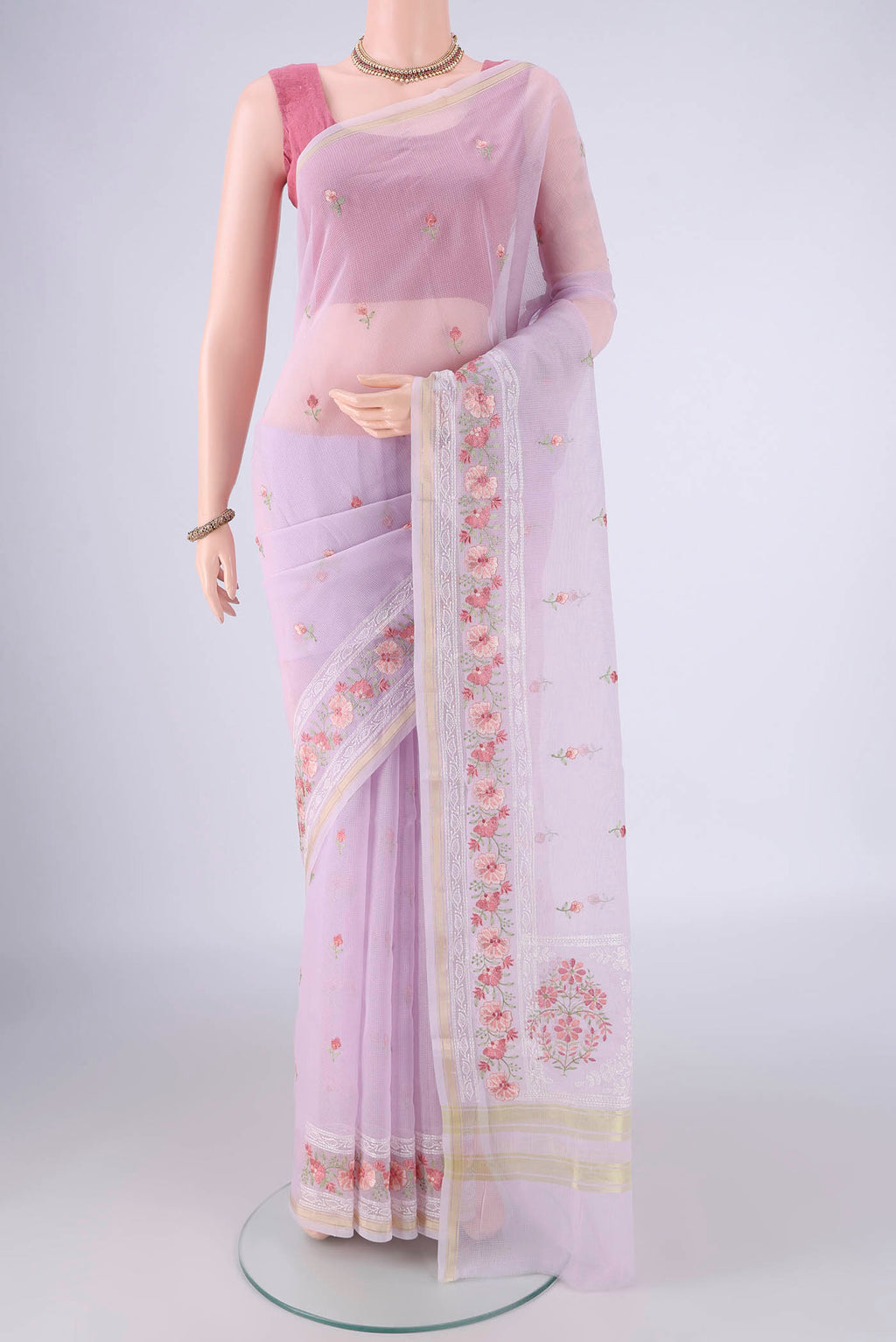 Lavender Blended Kota Cotton Saree with Embroidery on the body and Zari Border.  displayed on a mannequin