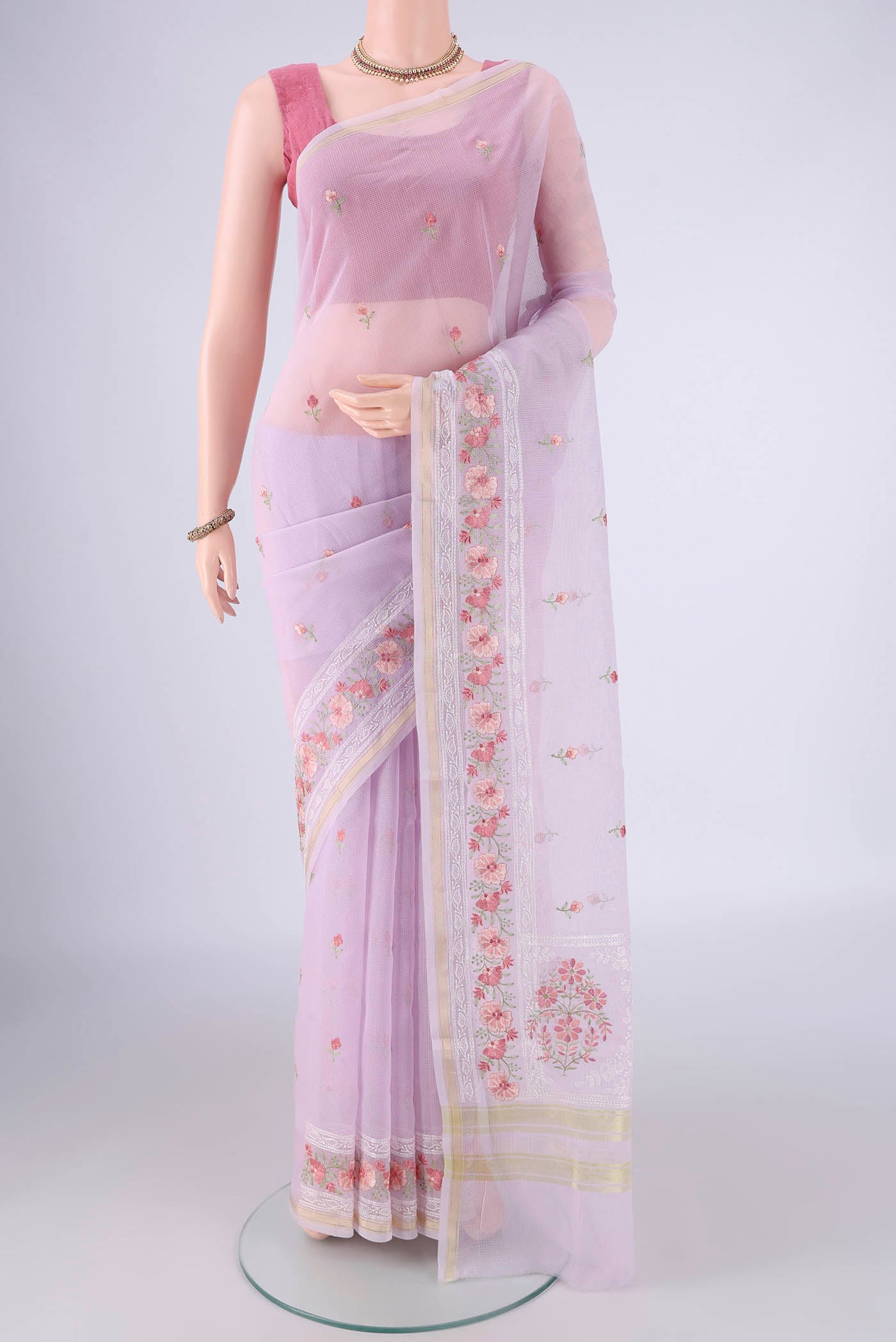 Lavender Blended Kota Cotton Saree with Embroidery on the body and Zari Border.  displayed on a mannequin