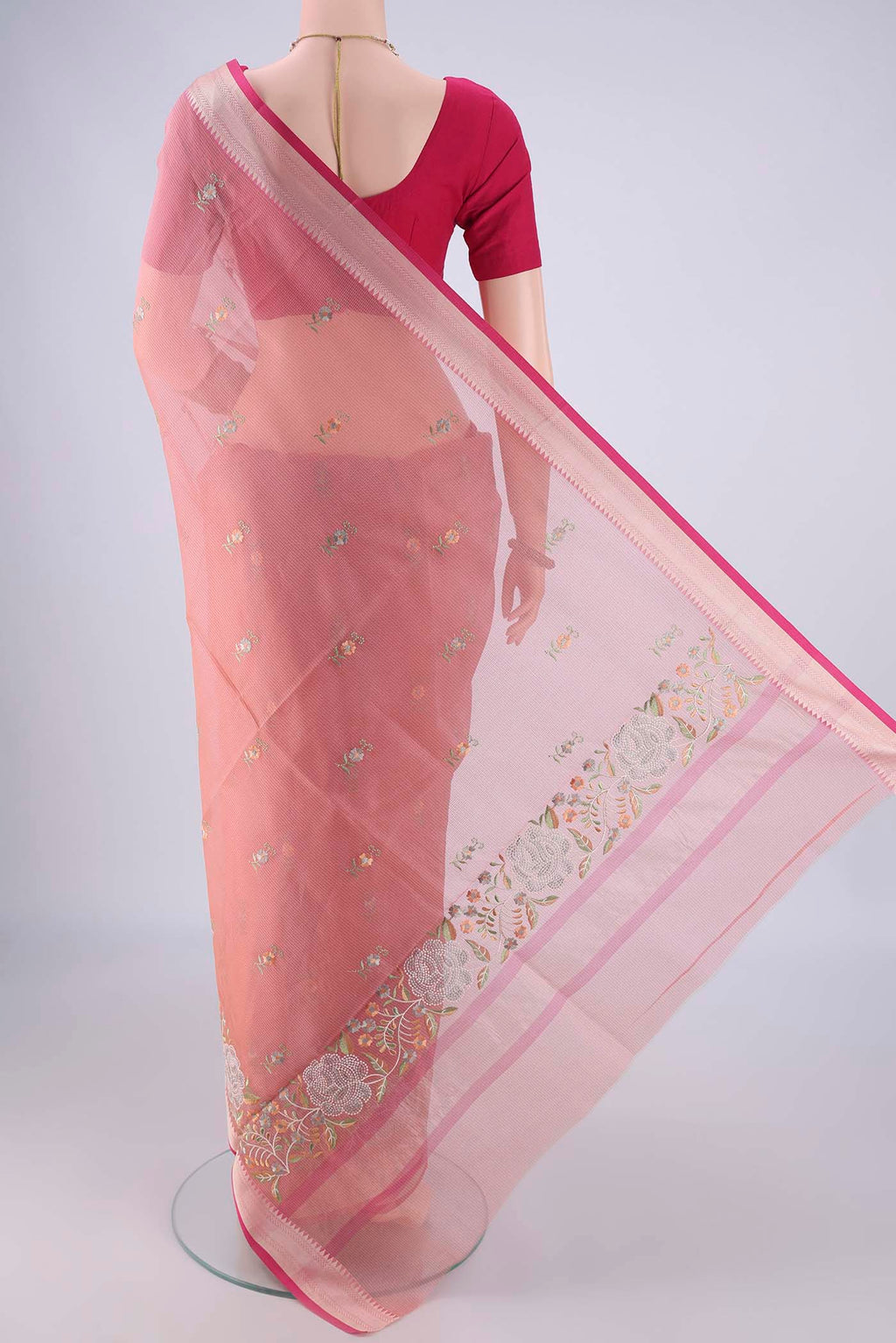 Flat view of Pink Blended Kota Cotton Saree with Embroidery on the body and Thread Border. 
