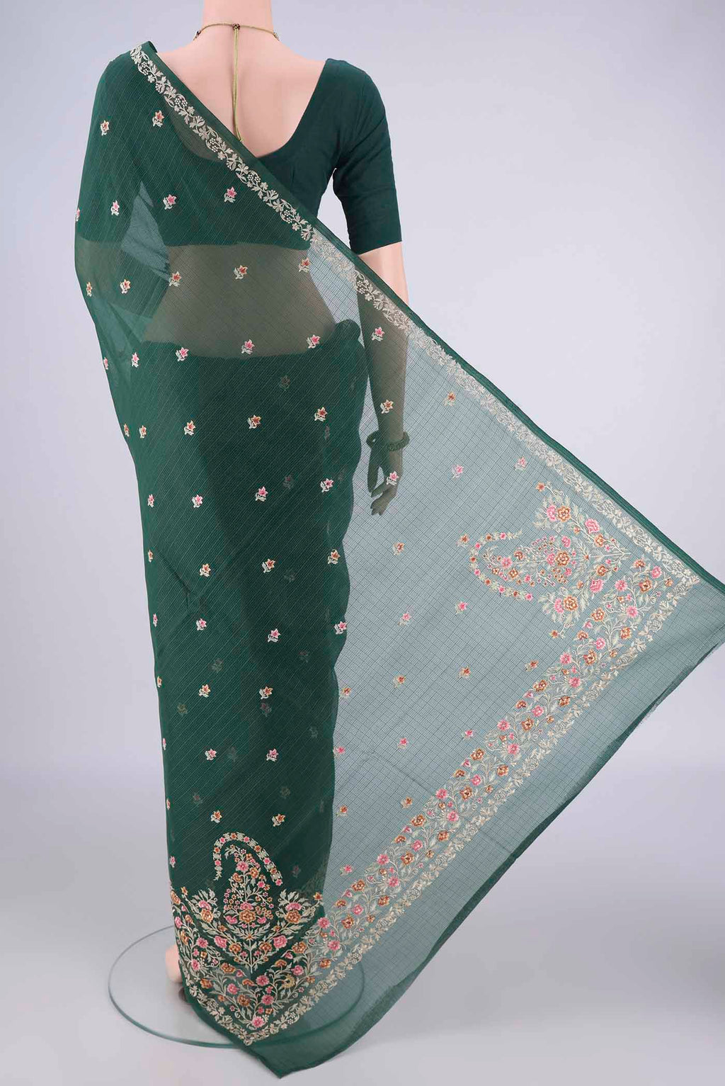 Flat view of Bottle Green Blended Kota Cotton Saree with Embroidery on the body and Embroidery Border. 