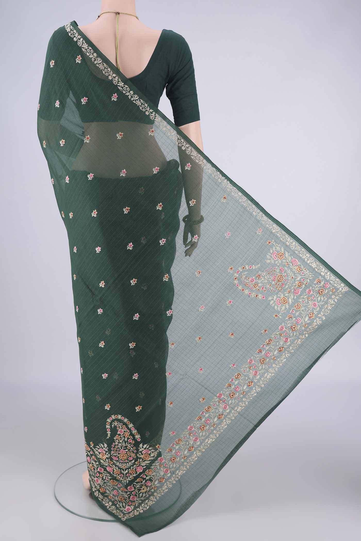 Flat view of Bottle Green Blended Kota Cotton Saree with Embroidery on the body and Embroidery Border. 