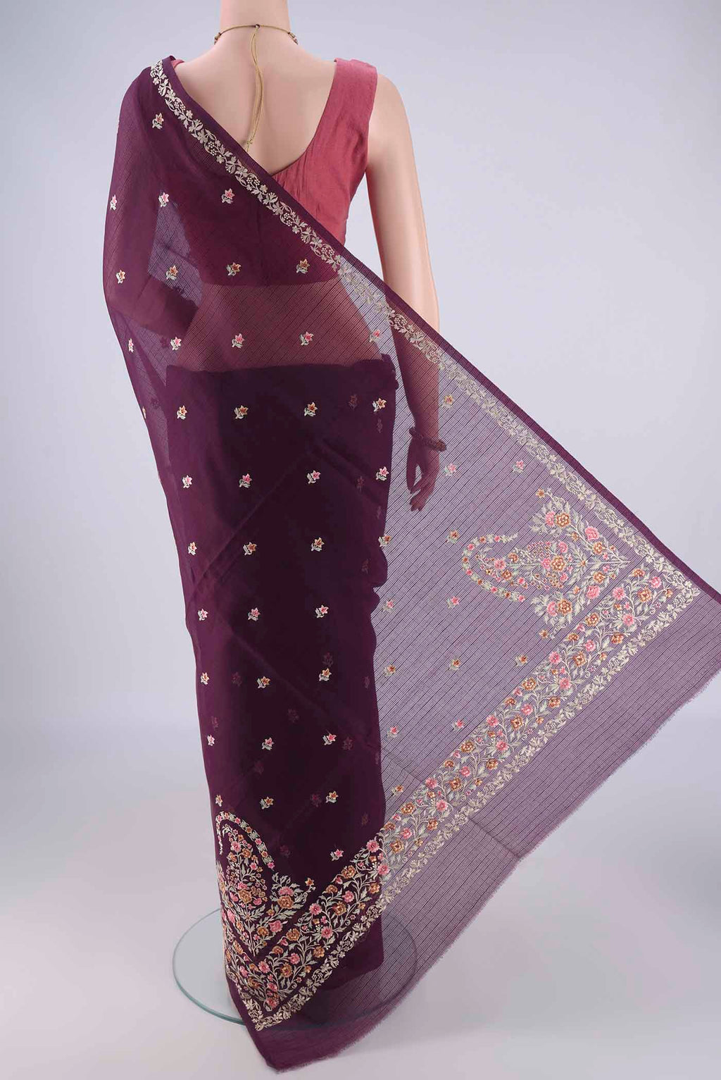 Flat view of Burgundy Blended Kota Cotton Saree with Embroidery on the body and Embroidery Border. 