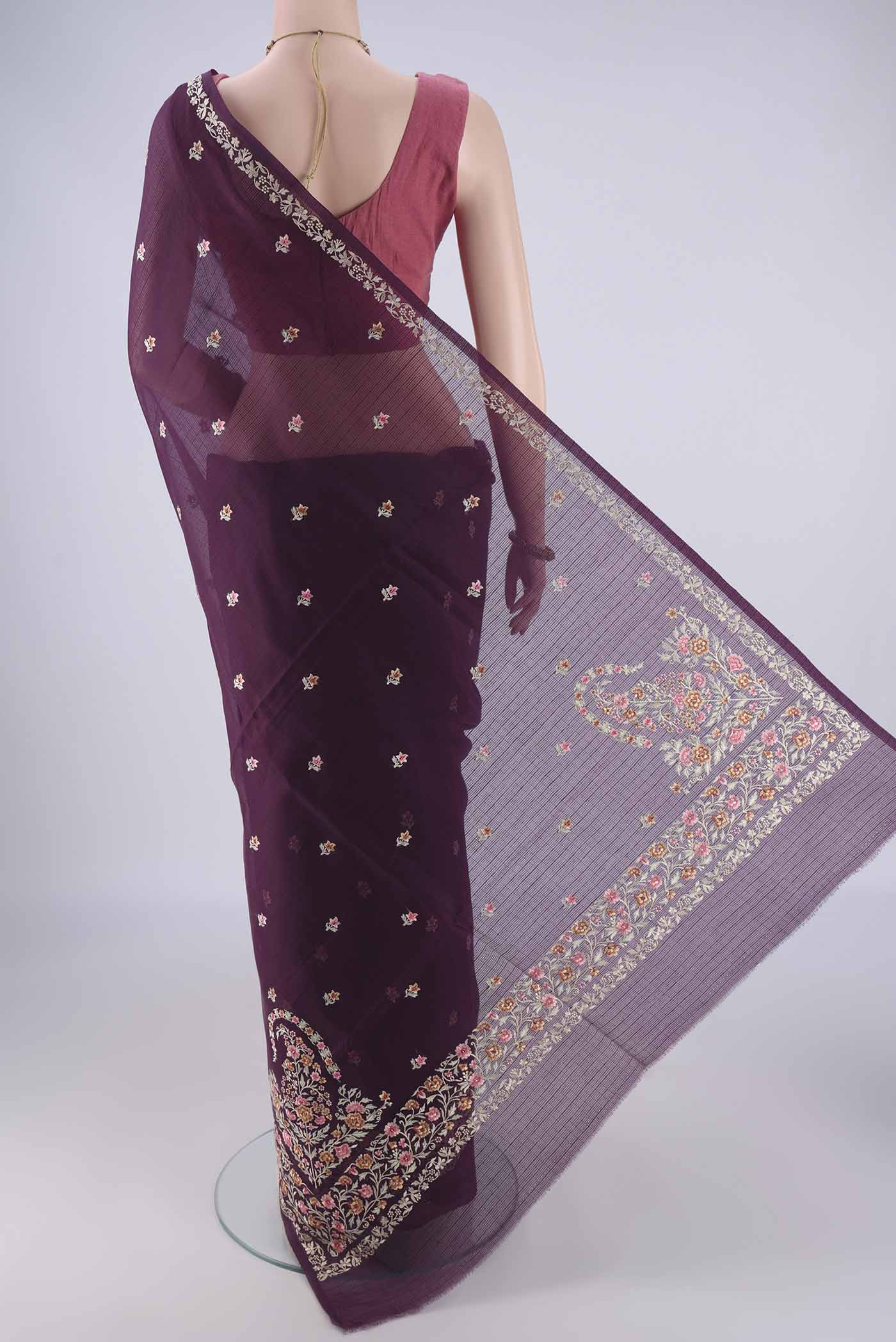 Flat view of Burgundy Blended Kota Cotton Saree with Embroidery on the body and Embroidery Border. 
