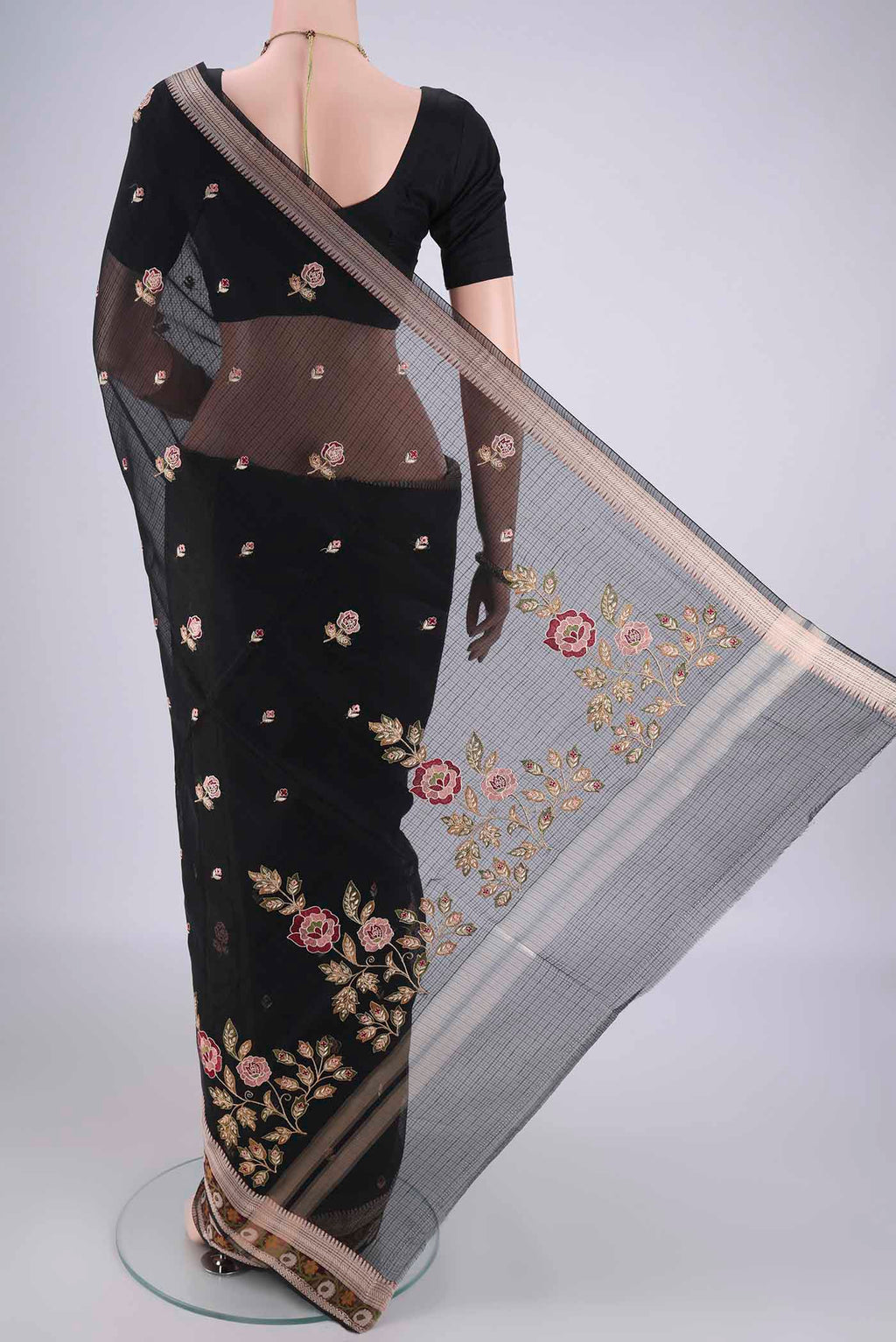 Flat view of Black Blended Kota Cotton Saree with Embroidery on the body and Zari Border. 