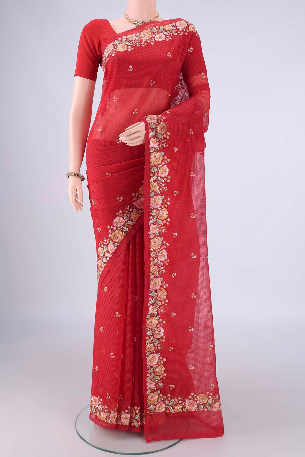 Red Blended Kota Cotton Saree with Embroidery on the body and Thread Border.  displayed on a mannequin