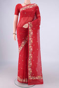 Red Blended Kota Cotton Saree with Embroidery on the body and Thread Border.  displayed on a mannequin