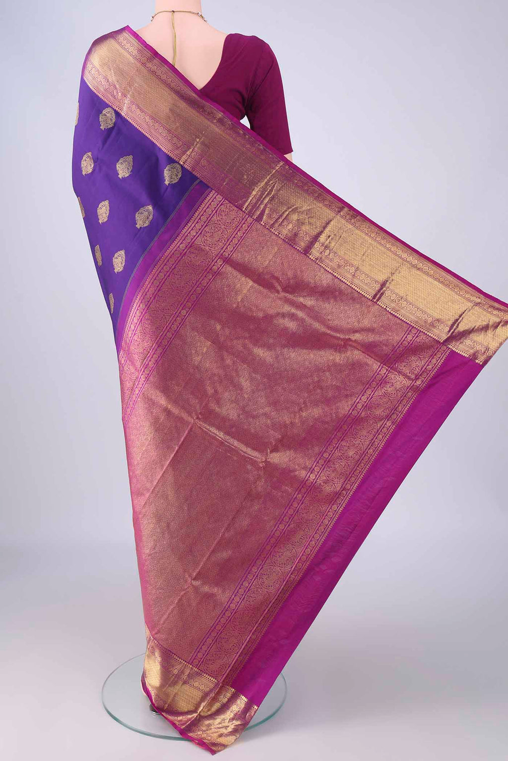 Flat view of Blue Kanjivaram Silk Saree with Zari Butta on the body and Zari Border. 