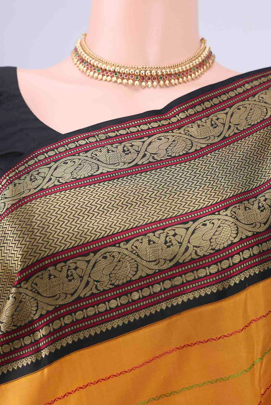 Border image of Mustard Dual Tone Kanjivaram Silk Saree with Veldhari on the body and Thread Border. 