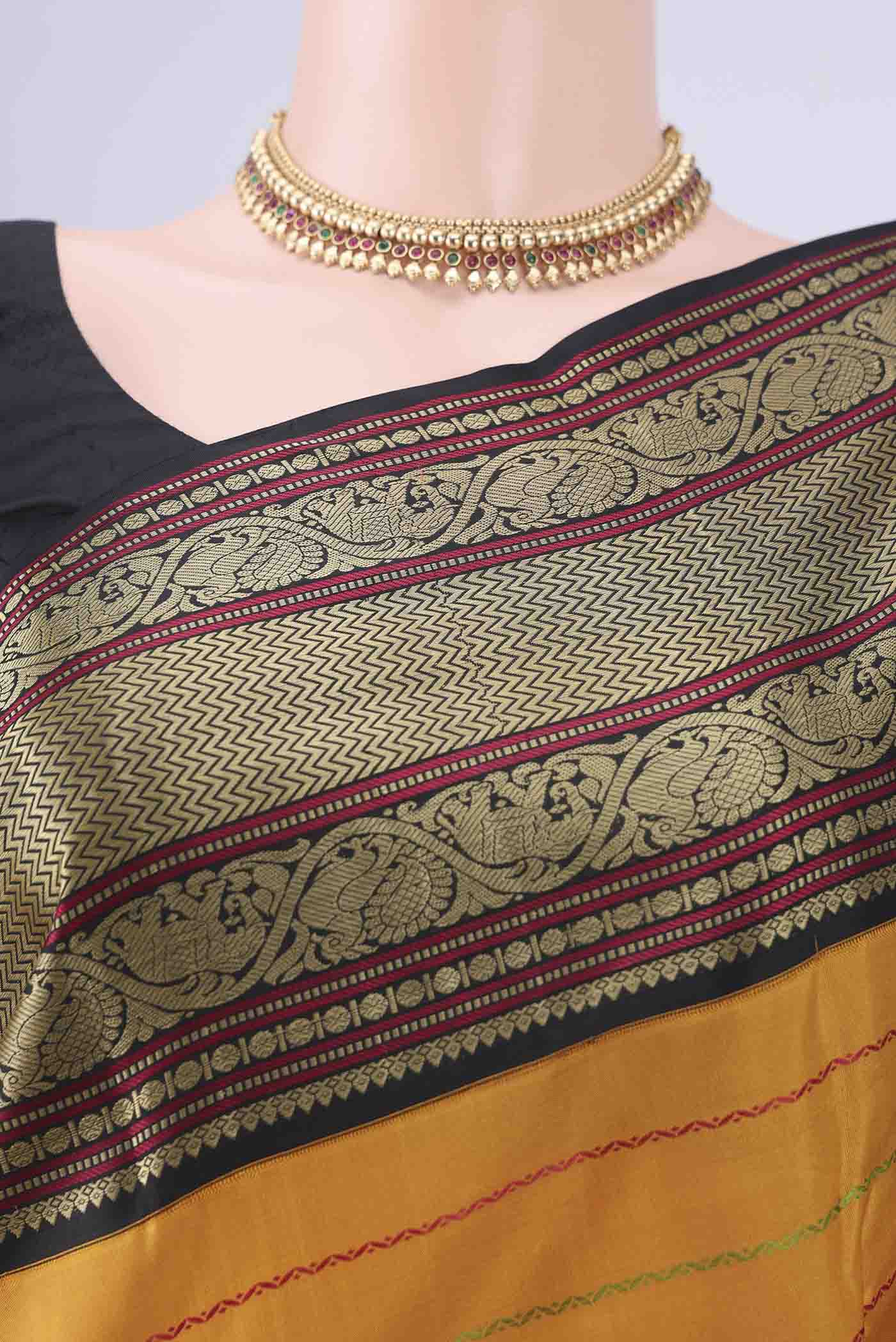 Border image of Mustard Dual Tone Kanjivaram Silk Saree with Veldhari on the body and Thread Border. 
