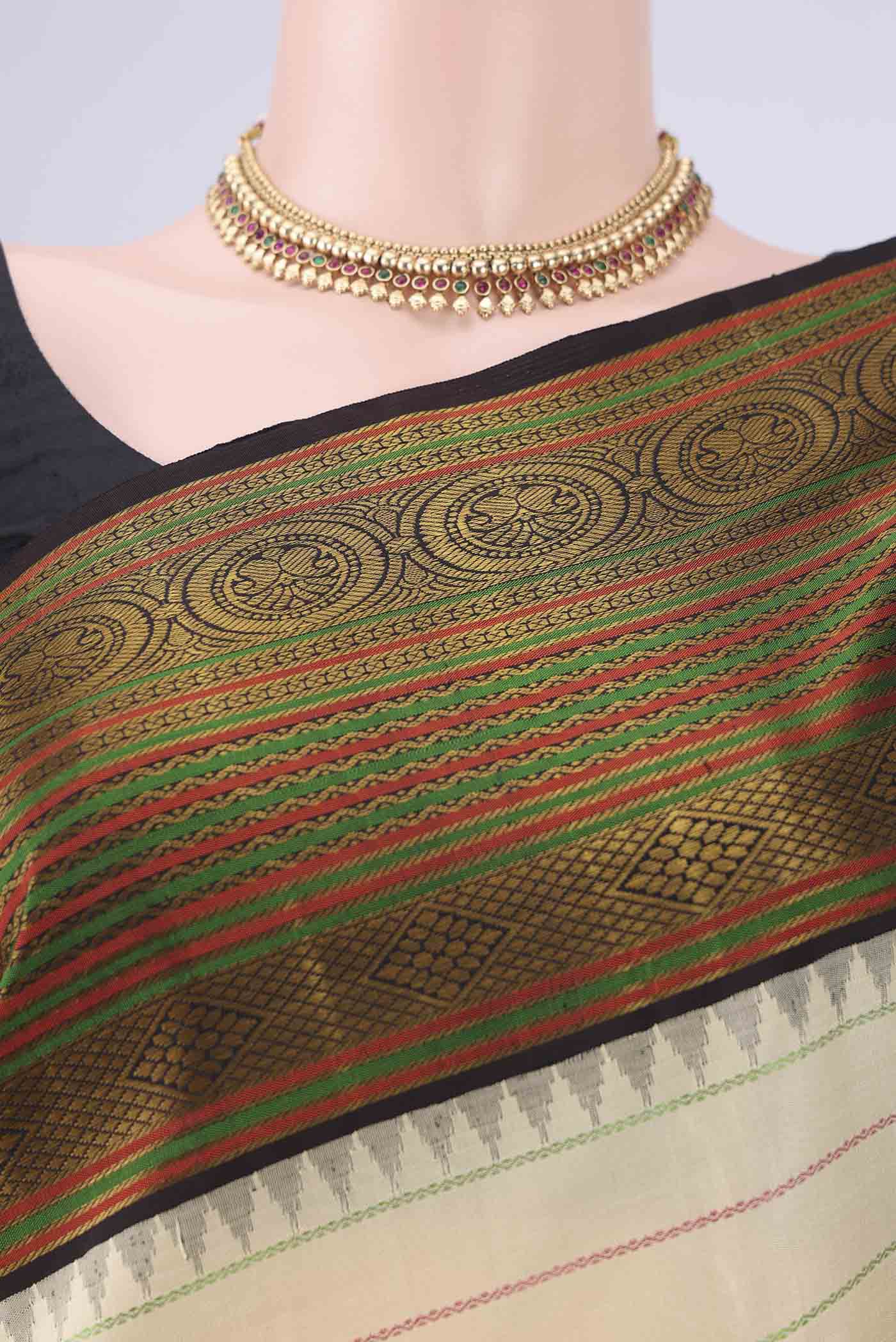 Border image of Cream Dual Tone Kanjivaram Silk Saree with Veldhari on the body and Thread Border. 
