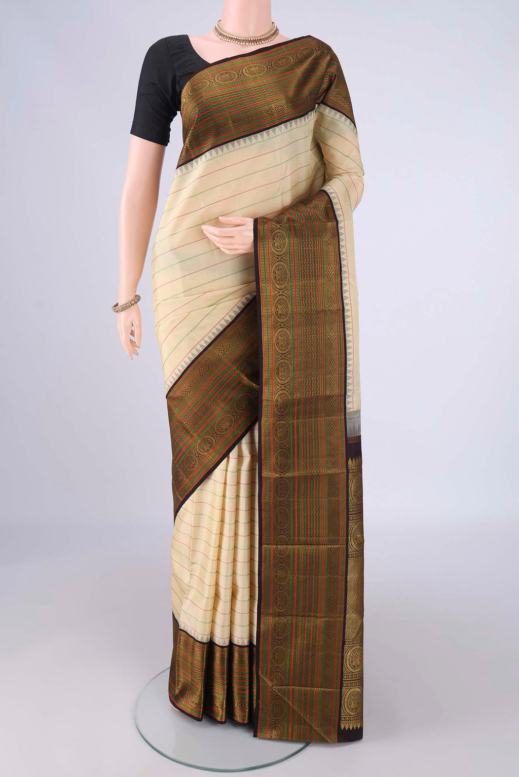 Cream Dual Tone Kanjivaram Silk Saree with Veldhari on the body and Thread Border.  displayed on a mannequin