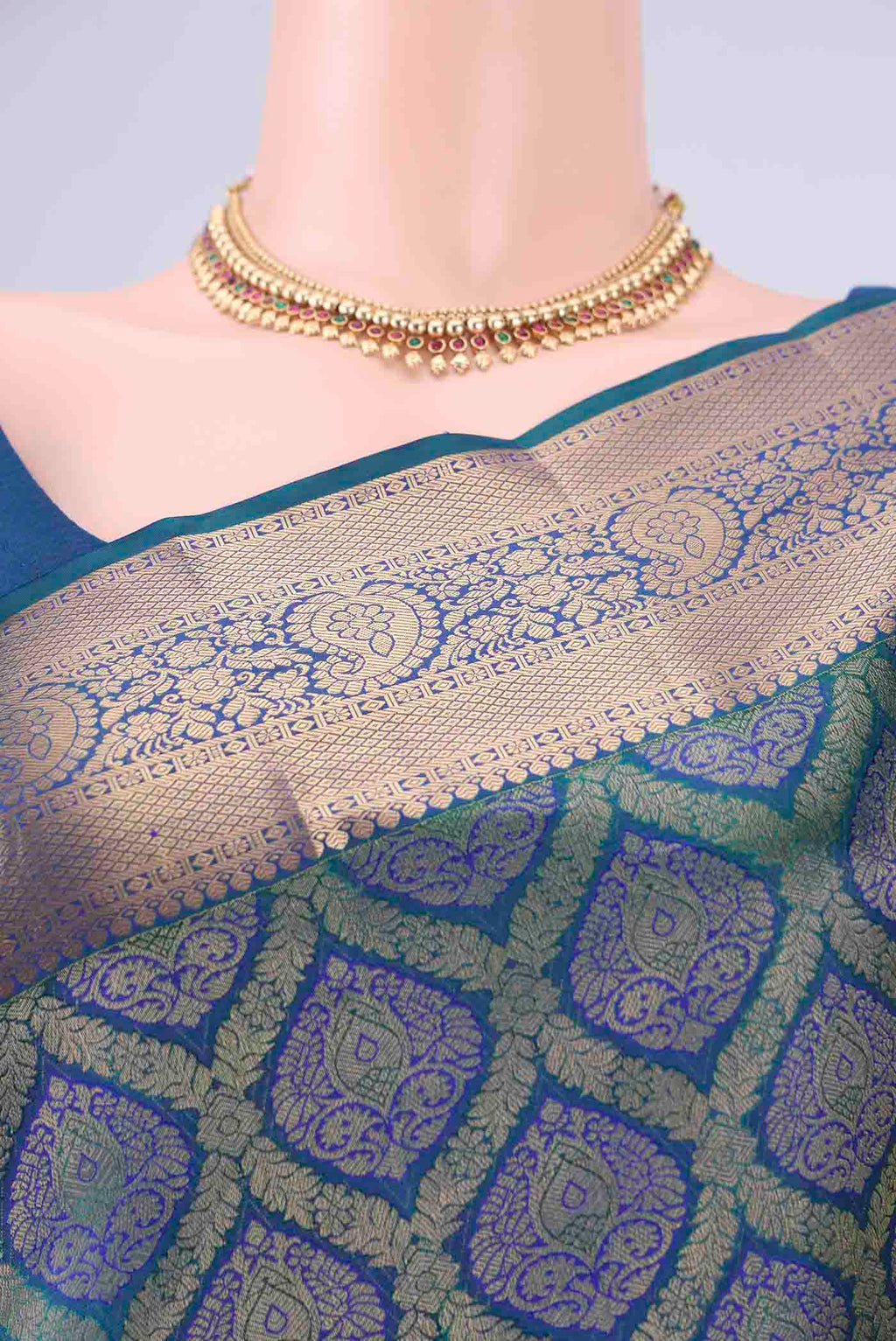 Border image of Peacock Blue Soft Silk Saree with Zari Brocade on the body and Zari Border. 