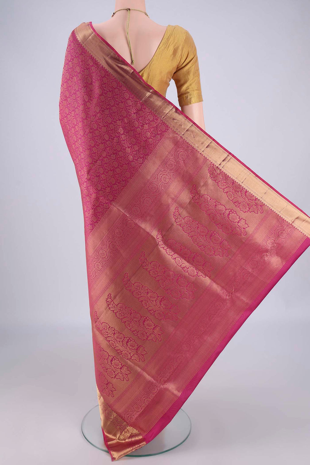 Flat view of Dark Pink Soft Silk Saree with Zari Brocade on the body and Zari Border. 