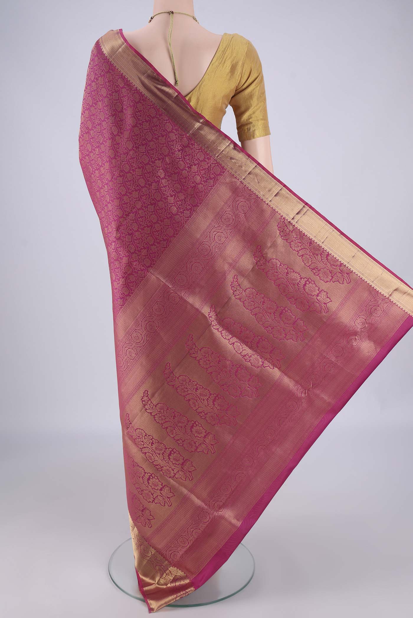 Flat view of Dark Pink Soft Silk Saree with Zari Brocade on the body and Zari Border. 