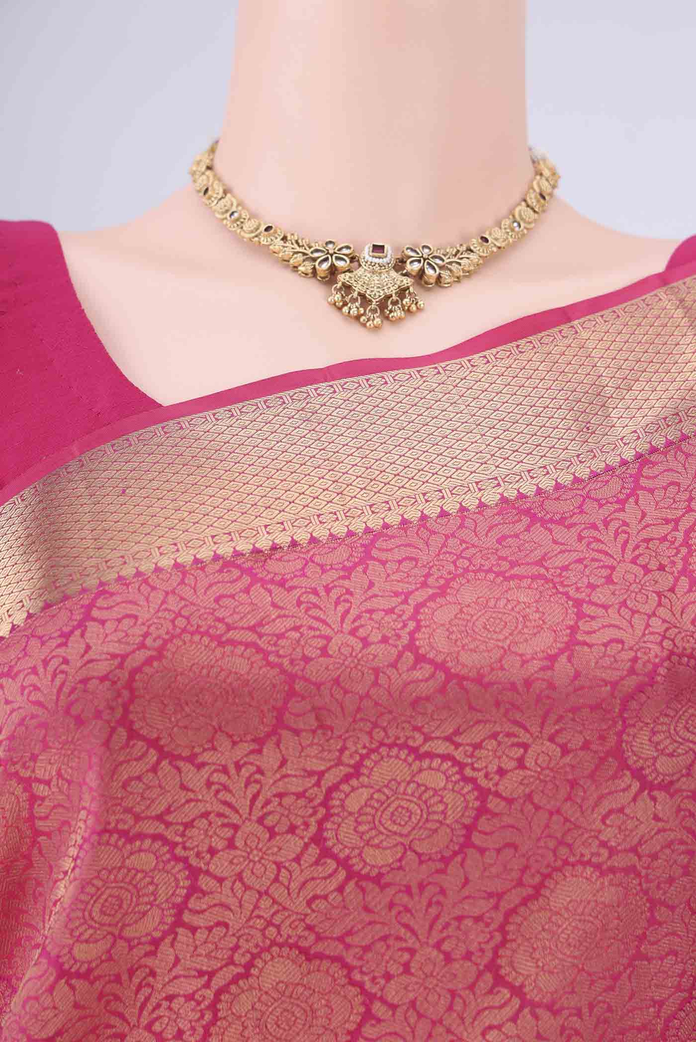 Border image of Dark Pink Soft Silk Saree with Zari Brocade on the body and Zari Border. 