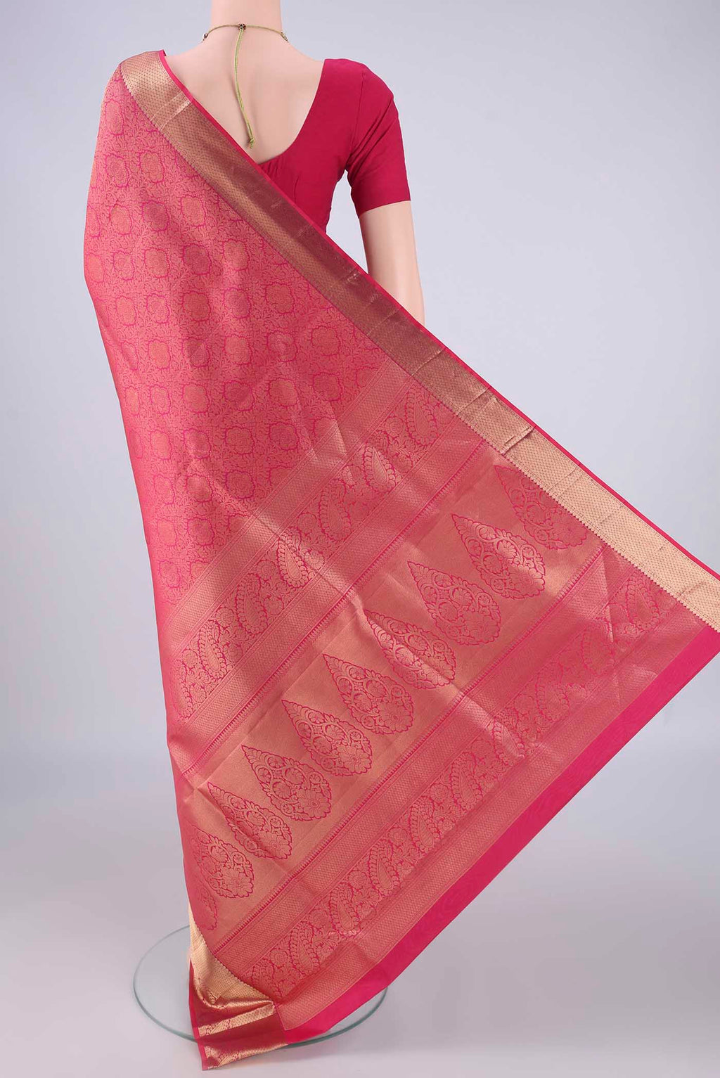 Flat view of Dark Pink Soft Silk Saree with Zari Brocade on the body and Zari Border. 