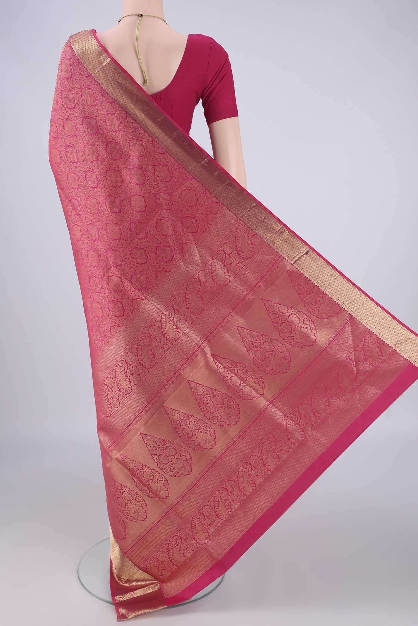 Flat view of Dark Pink Soft Silk Saree with Zari Brocade on the body and Zari Border. 