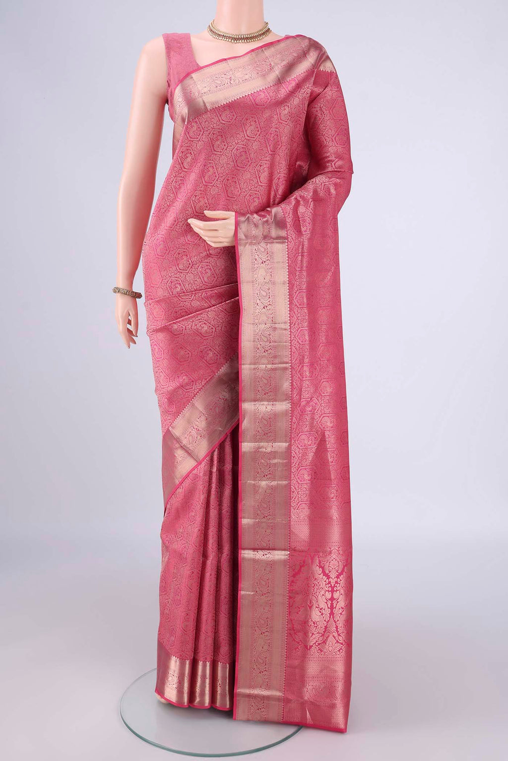 Pink Soft Silk Saree with Zari Brocade on the body and Zari Border.  displayed on a mannequin