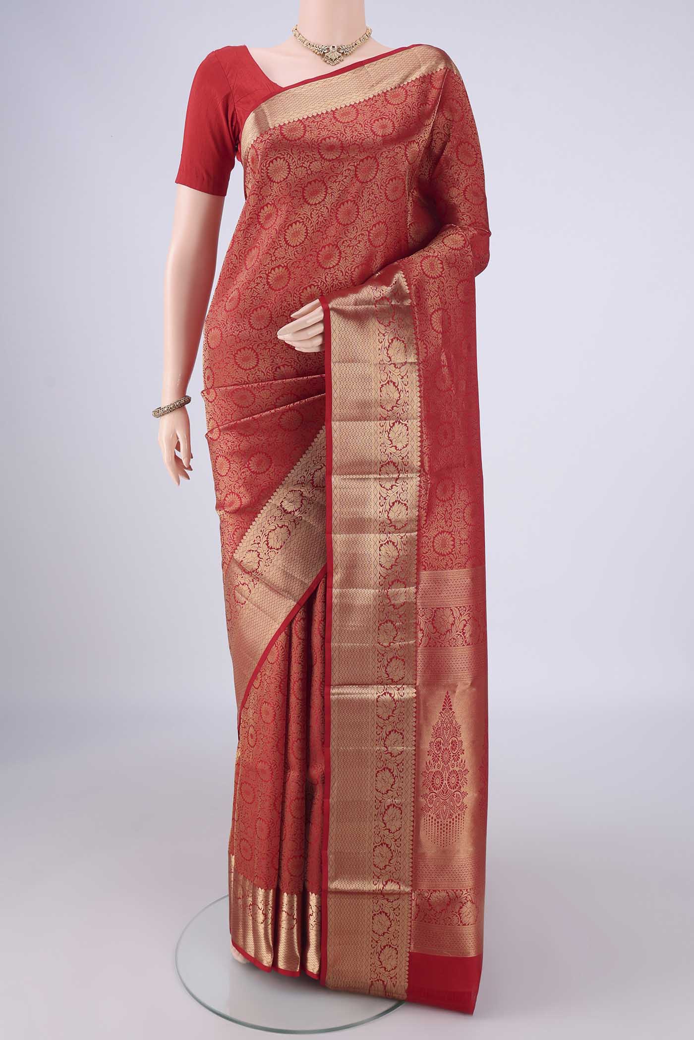 Red Soft Silk Saree with Zari Brocade on the body and Zari Border.  displayed on a mannequin