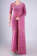 Mauve Mysore Crepe Saree with Plain Body and Zari Border.  displayed on a mannequin