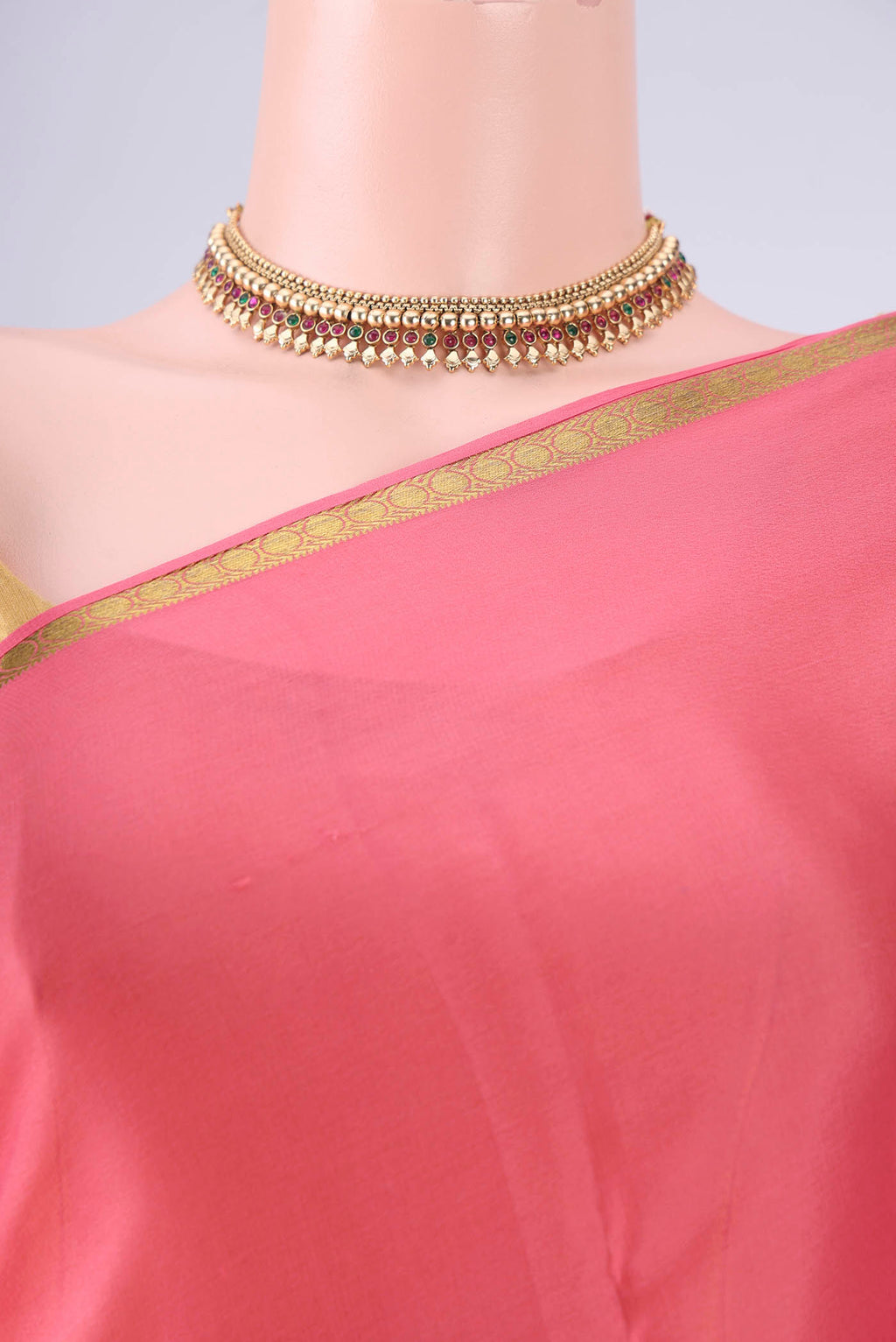 Border image of Peach Mysore Crepe Saree with Plain Body and Zari Border. 