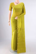 Parrot Green Mysore Crepe Saree with Plain Body and Zari Border.  displayed on a mannequin