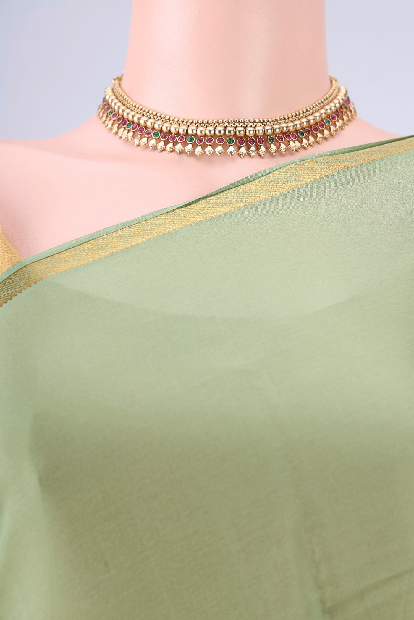 Border image of Pista Green Mysore Crepe Saree with Plain Body and Zari Border. 