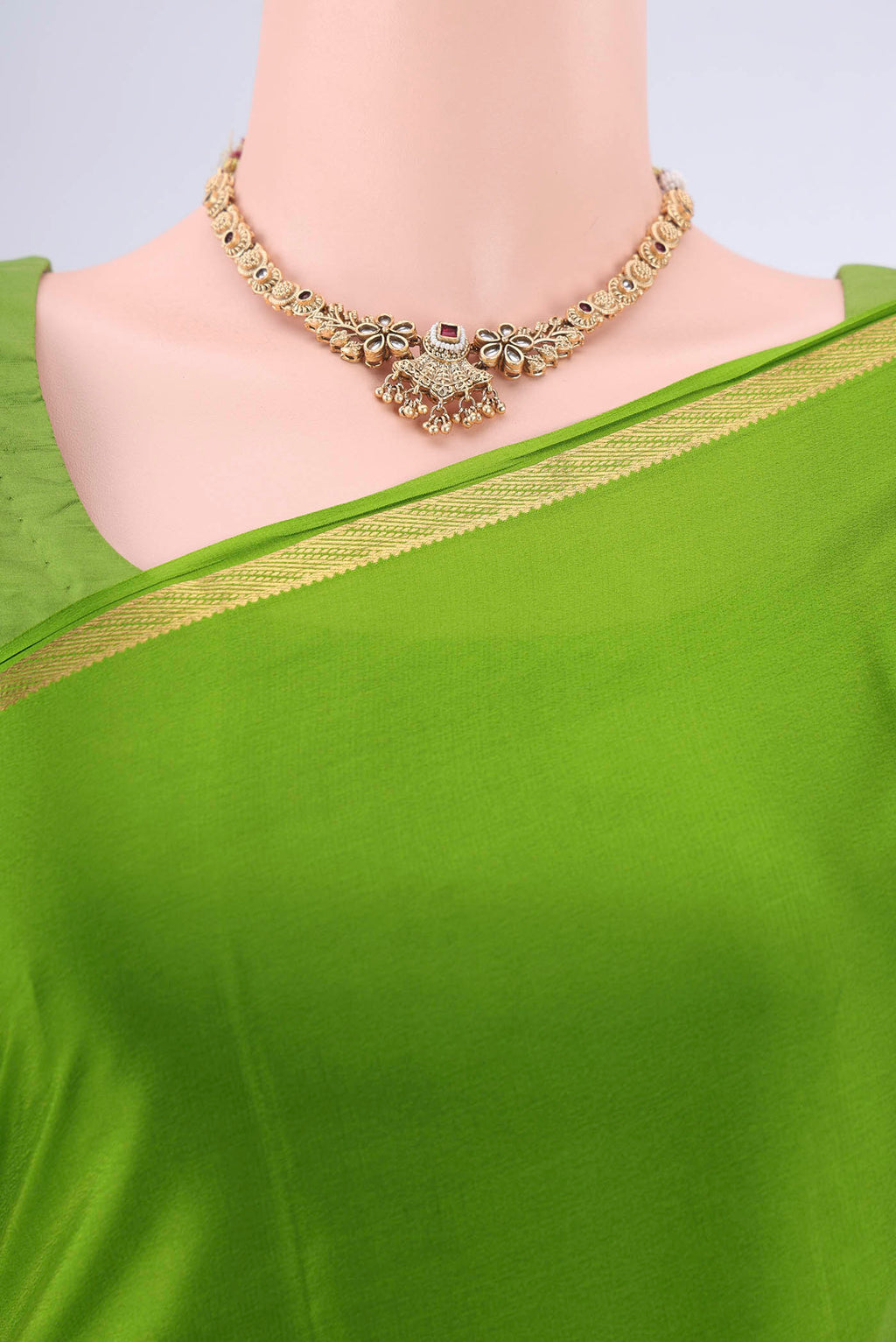 Border image of Green Mysore Crepe Saree with Plain Body and Zari Border. 
