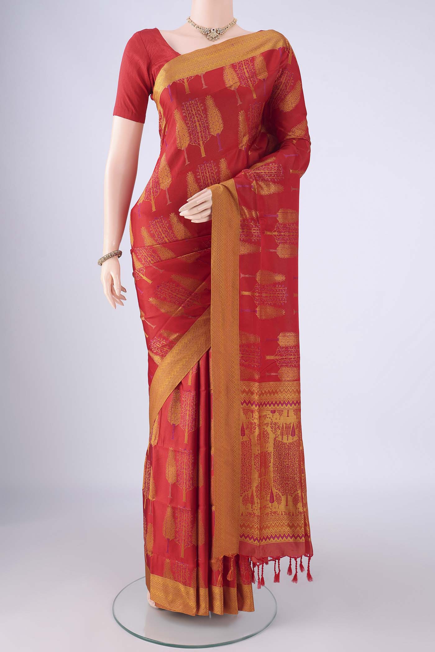 Red Soft Silk Saree with Thread Butta on the body and Thread Border.  displayed on a mannequin
