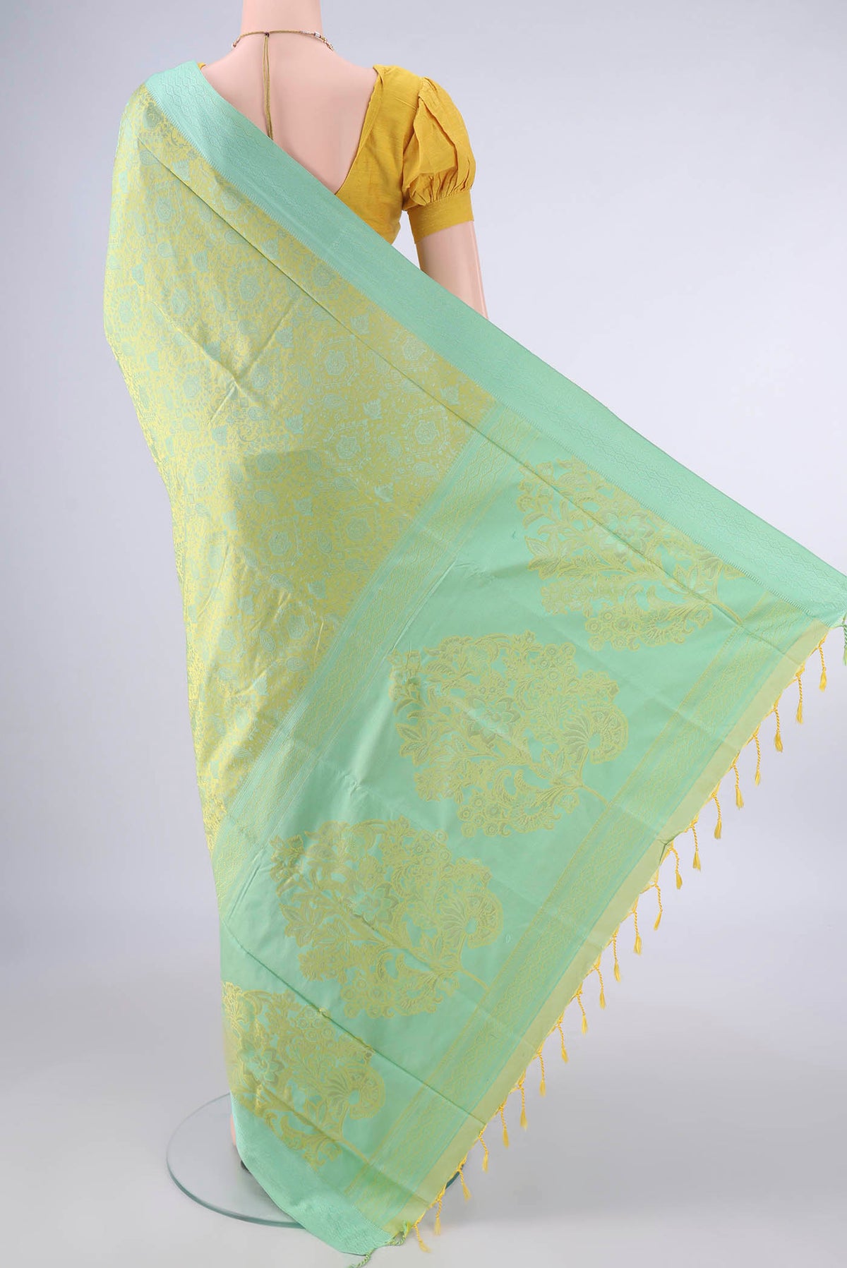 Flat view of Pure Silk Acid Green Soft Saree with Jacquard design on the body and Thread Border. 