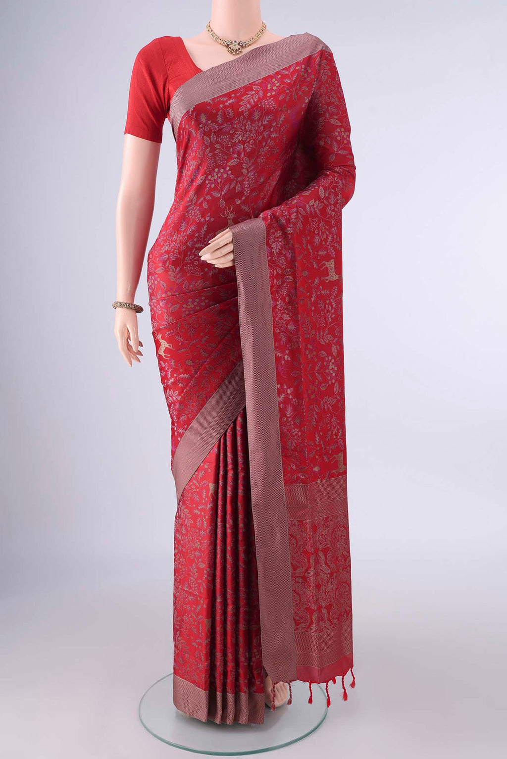 Pure Silk Red Soft Saree with Jacquard design on the body and Thread Border.  displayed on a mannequin