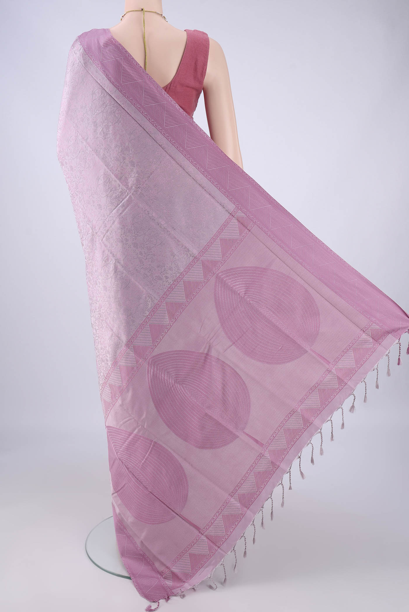 Flat view of Lavender Soft Silk Saree with Jacquard design on the body and Thread Border. 