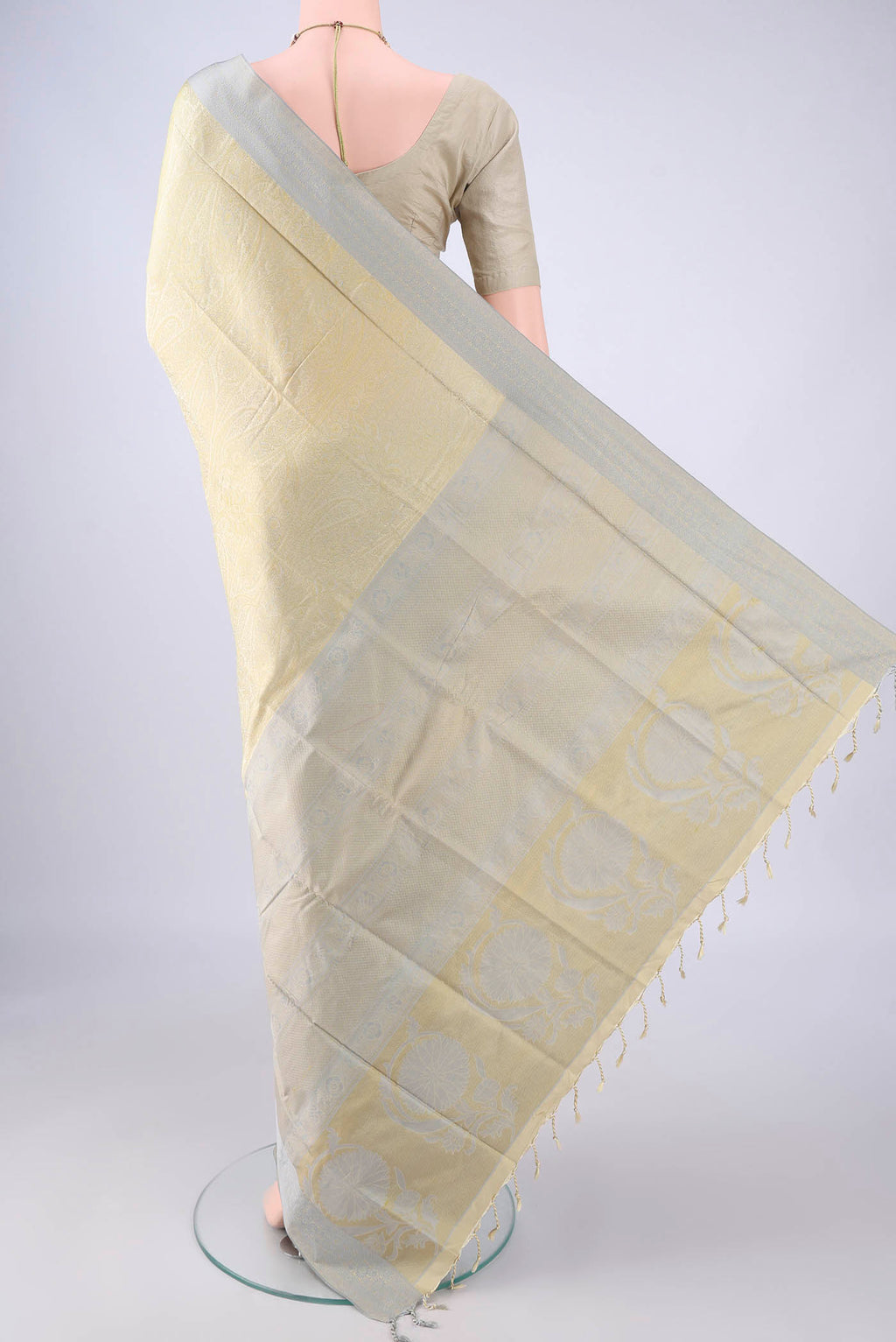 Flat view of Beige Dual Tone Soft Silk Saree with Jacquard design on the body and Thread Border. 