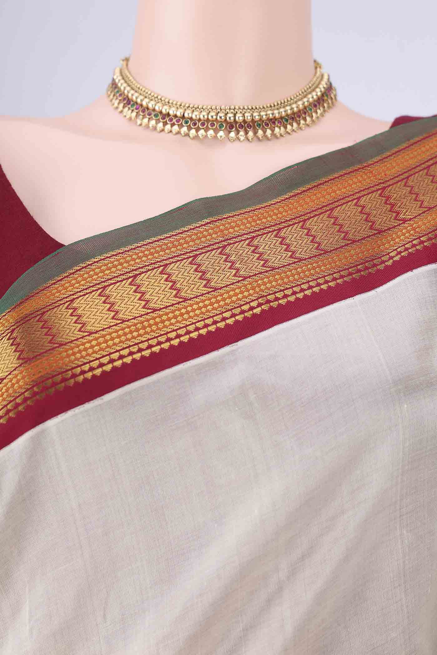 Border image of Cream Coimbatore Silk Cotton Saree with Plain Body and Zari Border. 