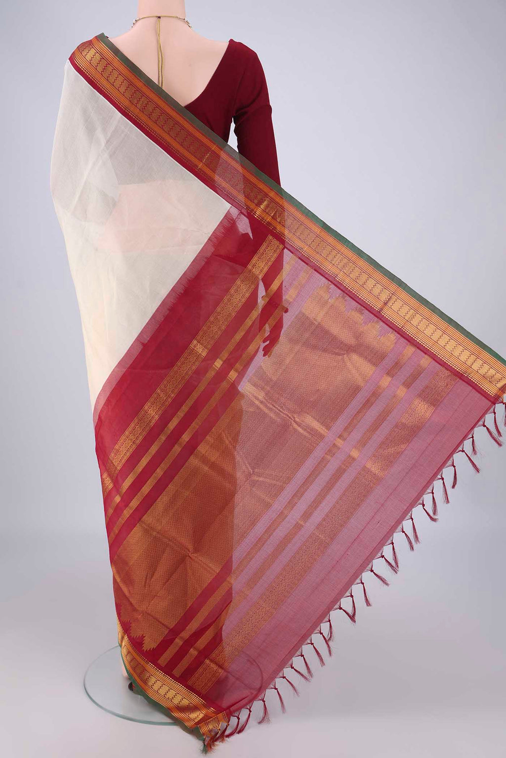 Flat view of Cream Coimbatore Silk Cotton Saree with Plain Body and Zari Border. 
