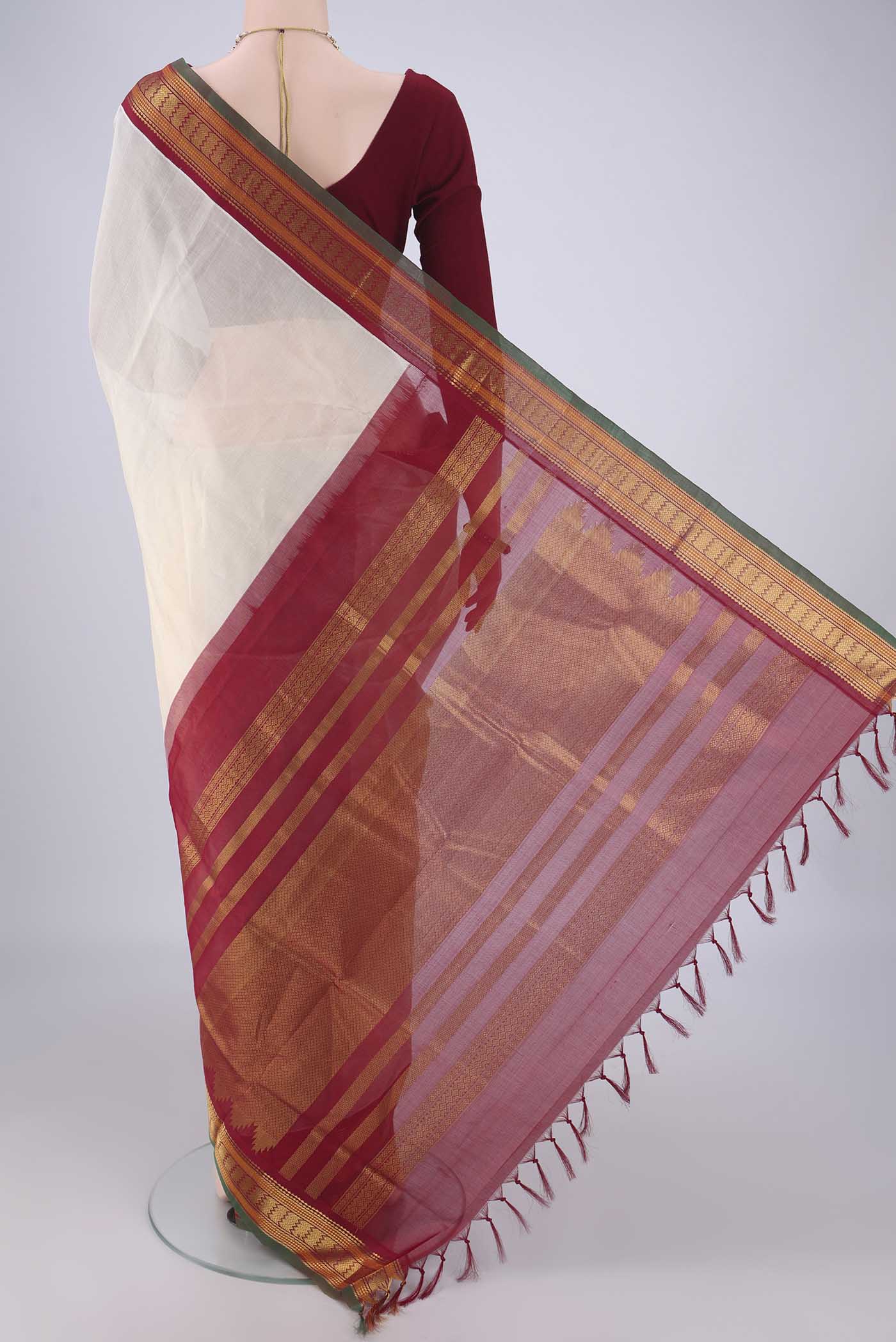 Flat view of Cream Coimbatore Silk Cotton Saree with Plain Body and Zari Border. 