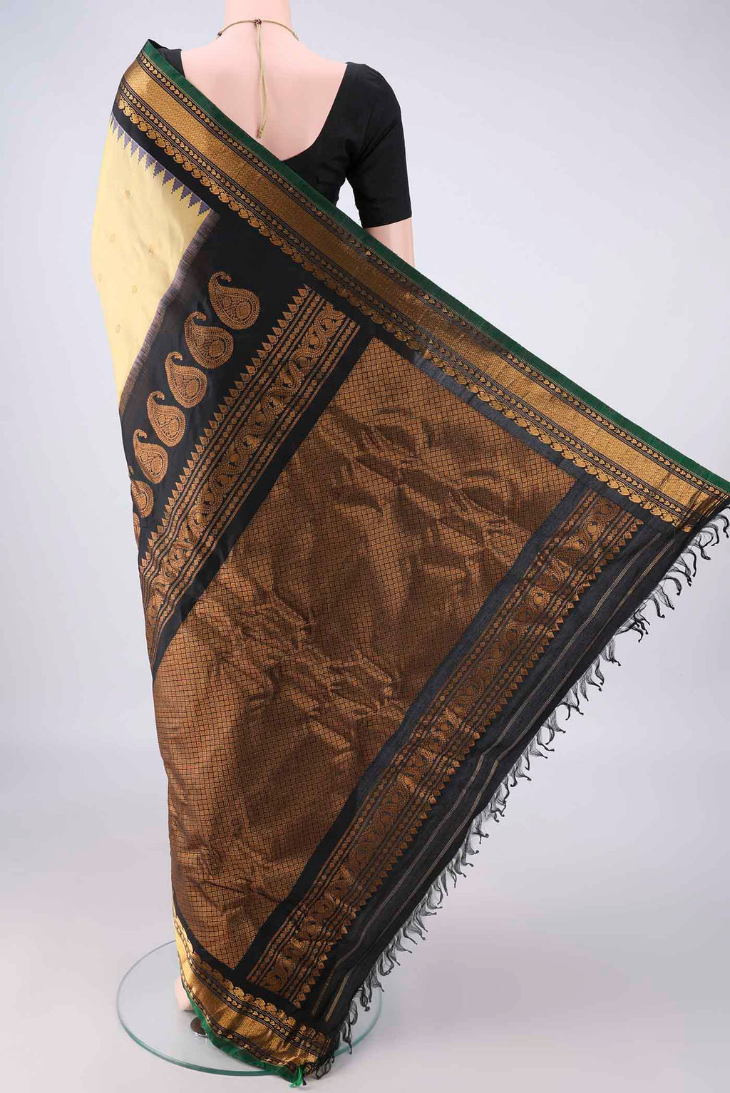 Flat view of Pure Silk Sandal Gadwal Saree with Zari Butta on the body and Zari Border. 