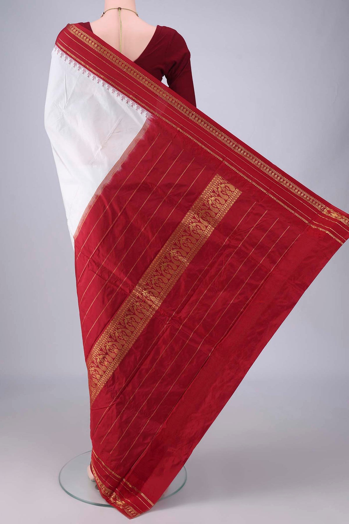 Flat view of Pure Silk White Bangalore - kadyal Saree with Plain Body and Temple Border. 