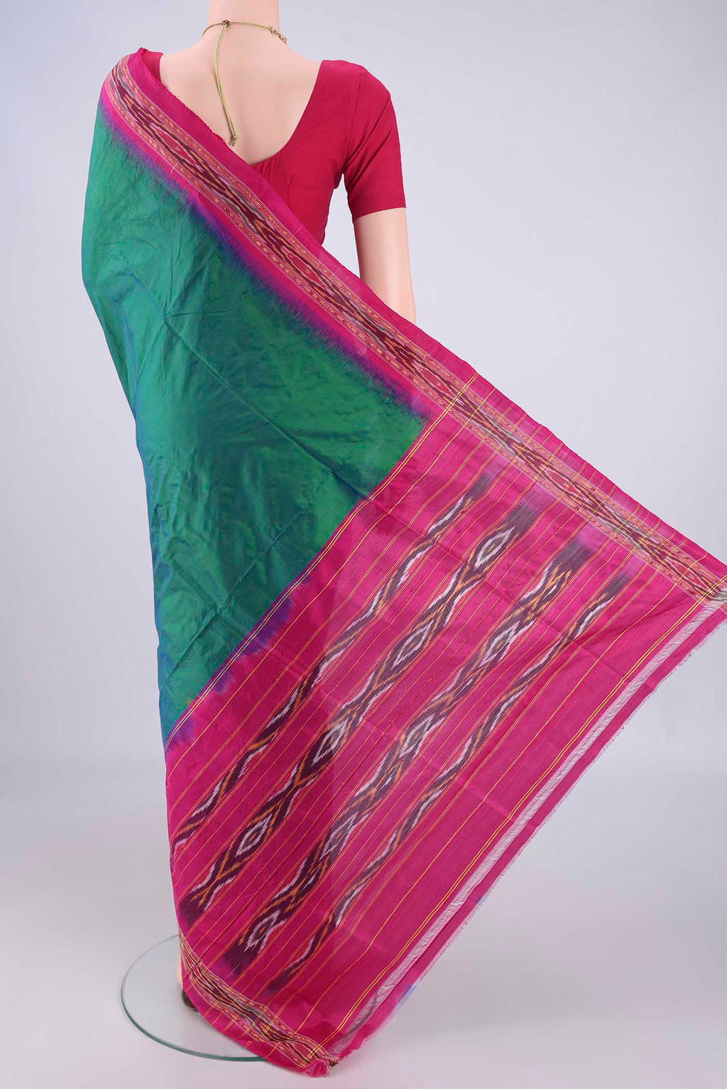 Flat view of Peacock Blue Pochampally Silk Saree with Plain Body and Zari Border. 