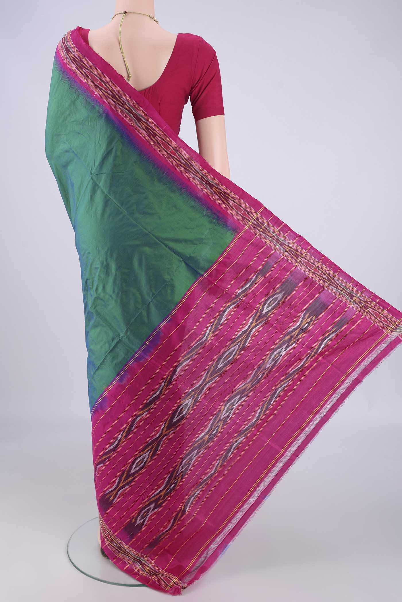 Flat view of Peacock Blue Pochampally Silk Saree with Plain Body and Zari Border. 