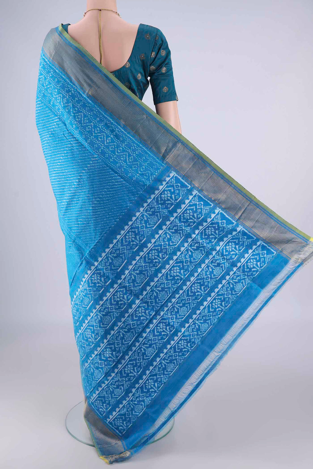 Flat view of Electric Blue Pochampally Silk Saree with Pure Ikat on the body and Zari Border. 